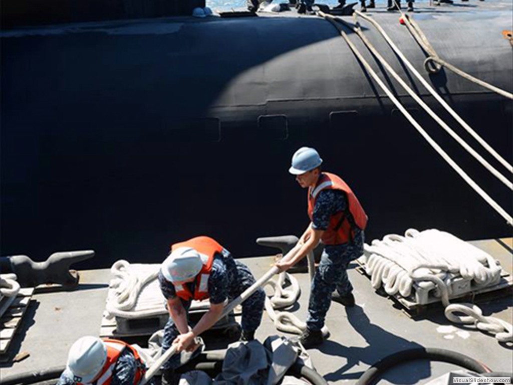 USS Alabama (SSBN-731) mooring after a deterrent patrol on July 9, 2014.