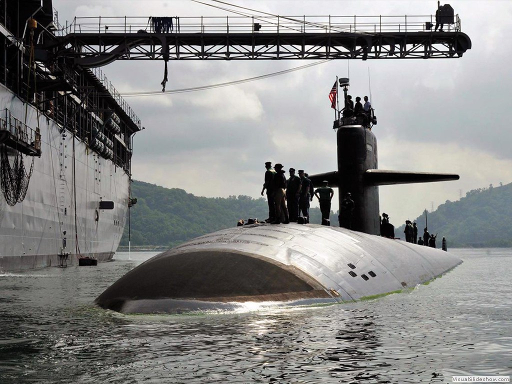 USS Louisville (SSN-724) pulls alongside USS E. S. Land (AS-39) in Malaysia 2012.