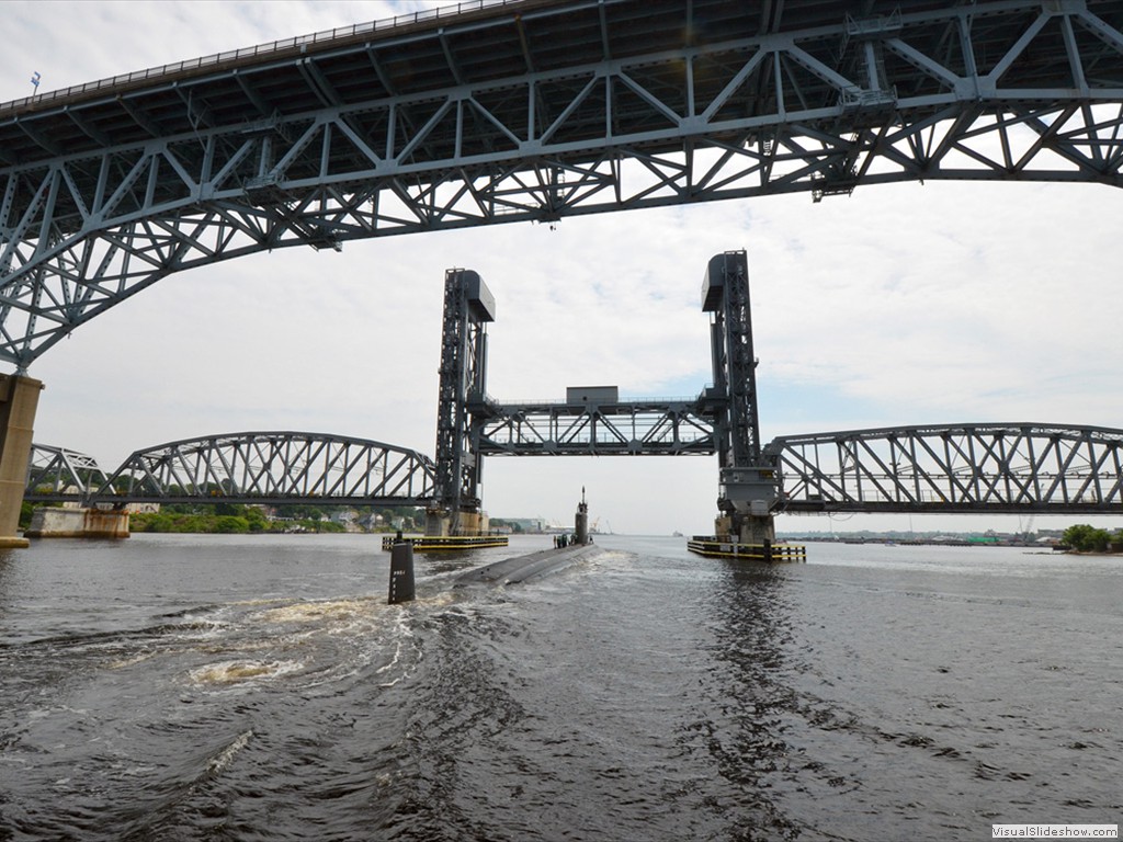 USS Missouri (SSN-780) passes under the Gold Star Bridge.