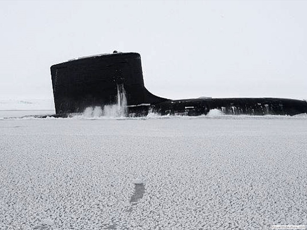 USS New Mexico (SSN-779) surfaces through the arctic ice during Ice Exercise (ICEX) 2014